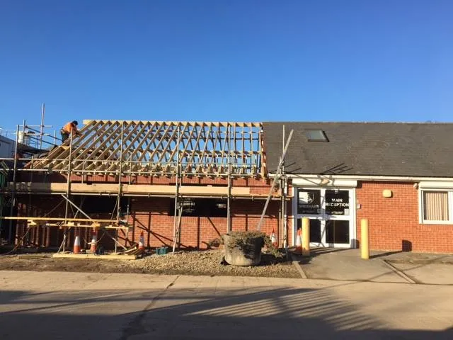a house being built with a roof trussing system