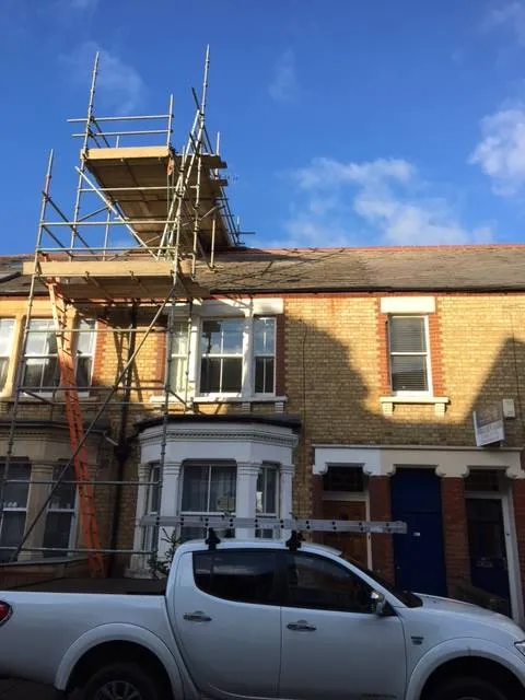 a house being built in the middle of a street