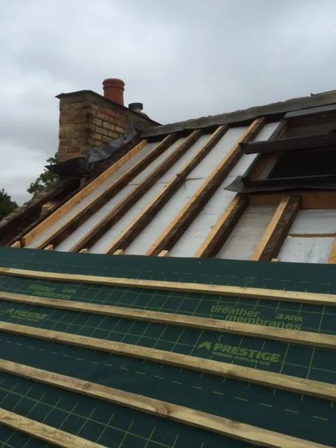 a roof with a roofing sheet on it