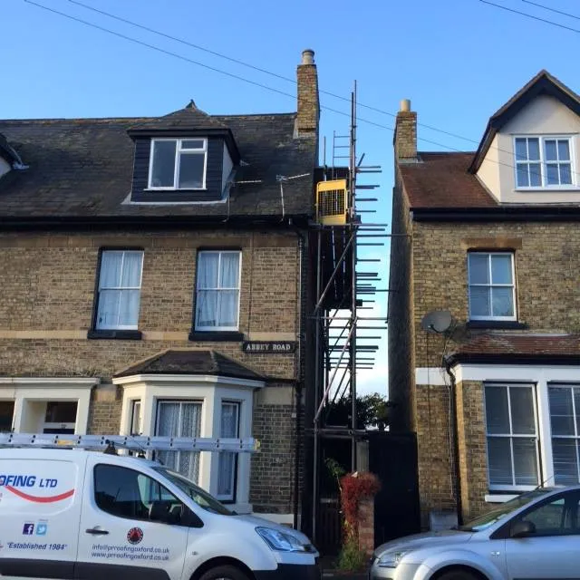 a house with a chimney on the roof